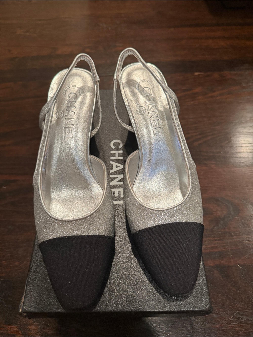CHANEL Silver Slingback Heels with Black Cap Toe